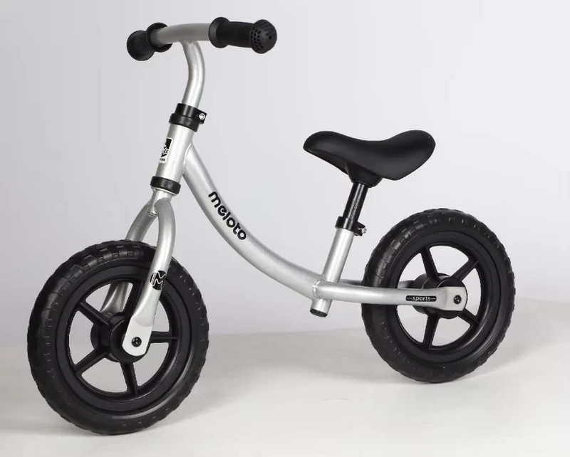 Metallic Silver Kids Balance Bike With Adjustable Padded Seat Puncture Proof Tires And Lightweight Curved Frame Set